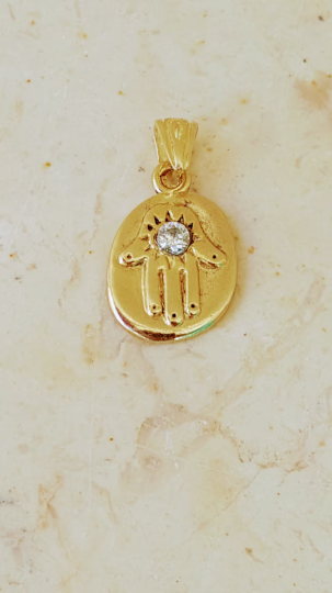 gold and diamond hamsa necklace,